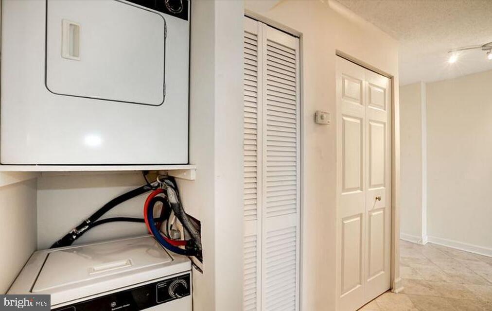 6800 Fleetwood Road, Unit 913 McLean, VA 22101 - Photo 11 of 13 Efficient laundry nook in modern home.