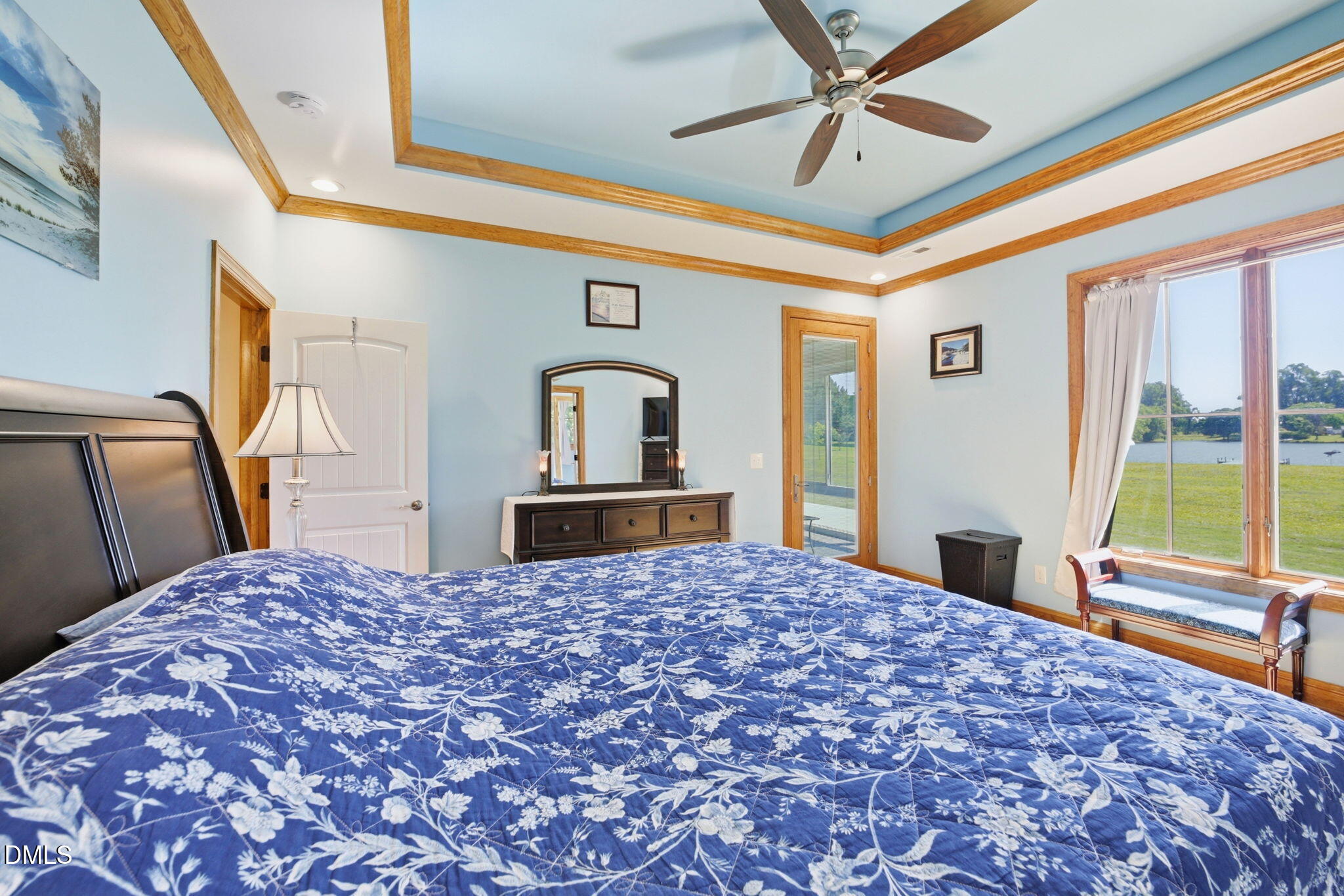 35 North Rippling Court Smithfield, NC 27577 - Photo 23 of 59 a bedroom with a large bed and a window