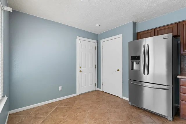 a view of kitchen and windows