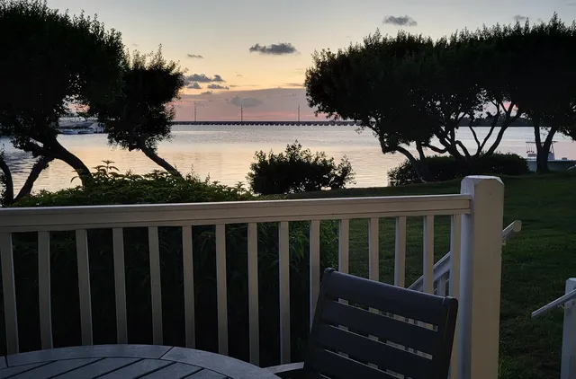 a bathroom with a sink a mirror and shower