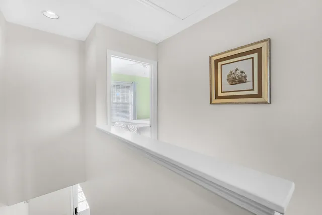 a bedroom with a bed and a tv