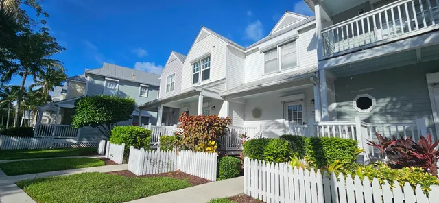 front view of a building with a yard