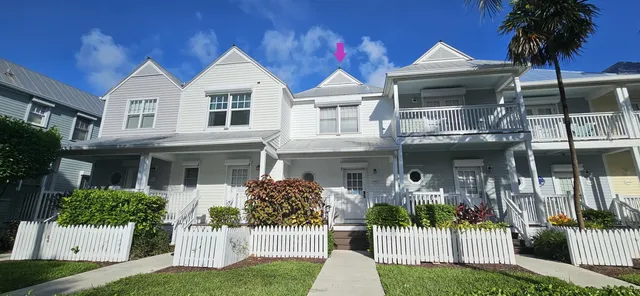 a view of hallway with windows