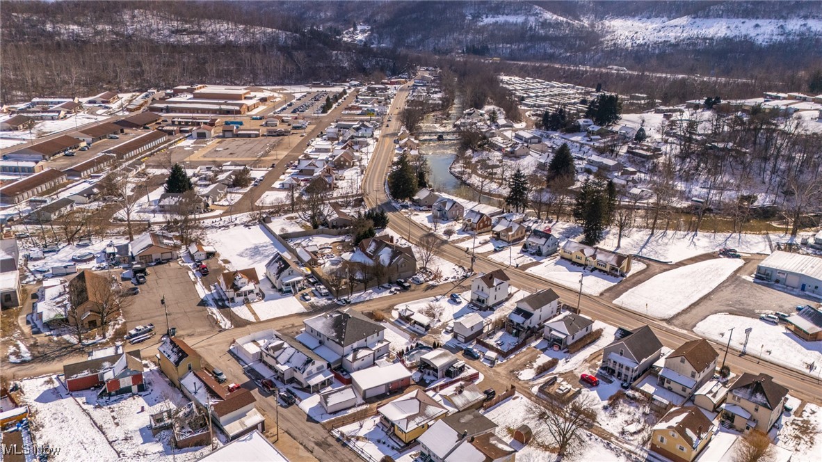 55577 National Road Bridgeport, OH 43912 - Photo 5 of 17 Snowy aerial view featuring a residential view