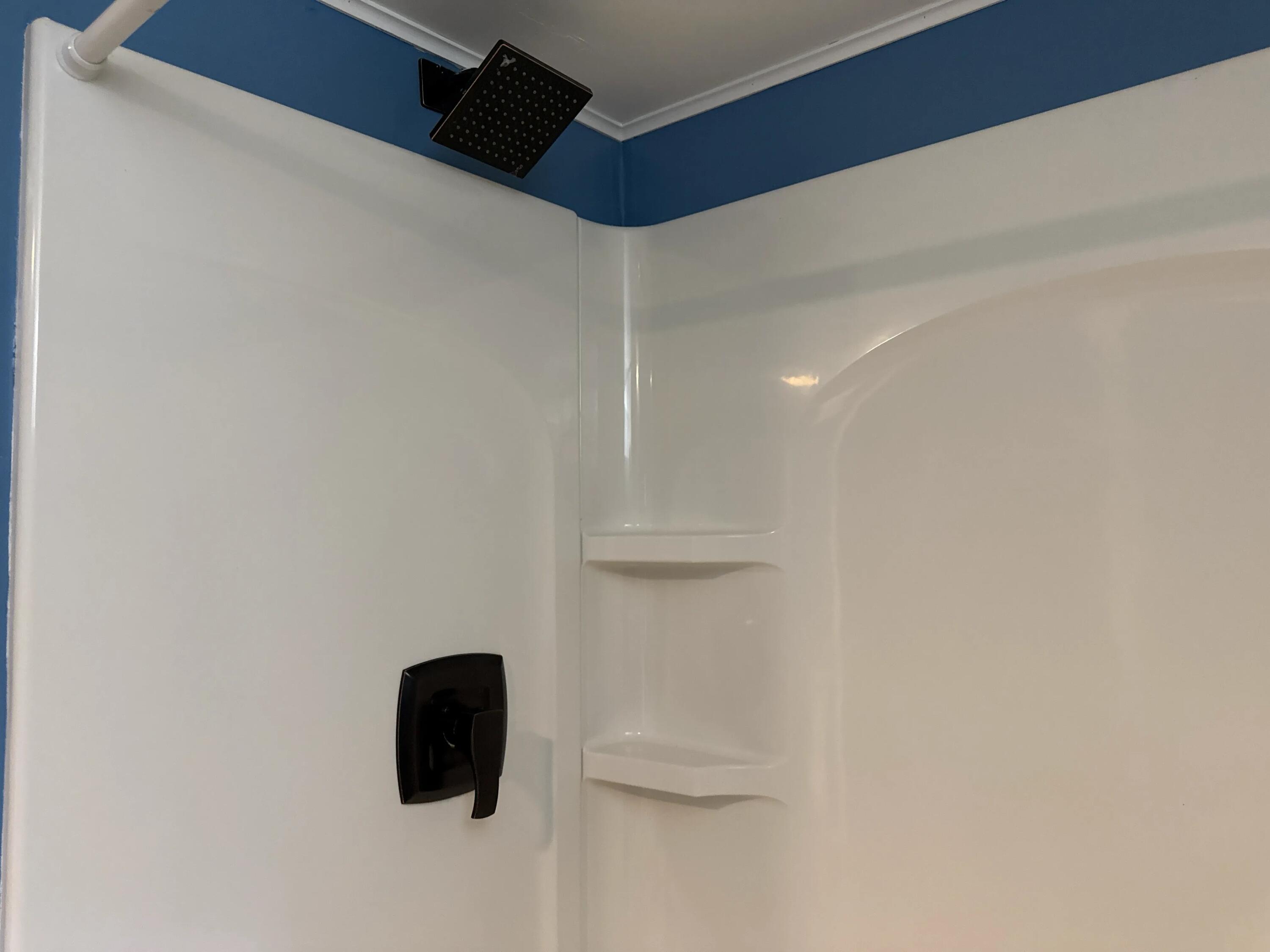 3800 Lasalle Street Racine, WI 53402 - Photo 65 of 74 Ceramic tile floor and handicap accessible shower with grab bars