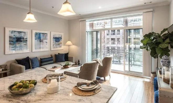 1050 West Monroe Street, Unit 401 Chicago, IL 60607 - Photo 4 of 17 a bed room with furniture and a window