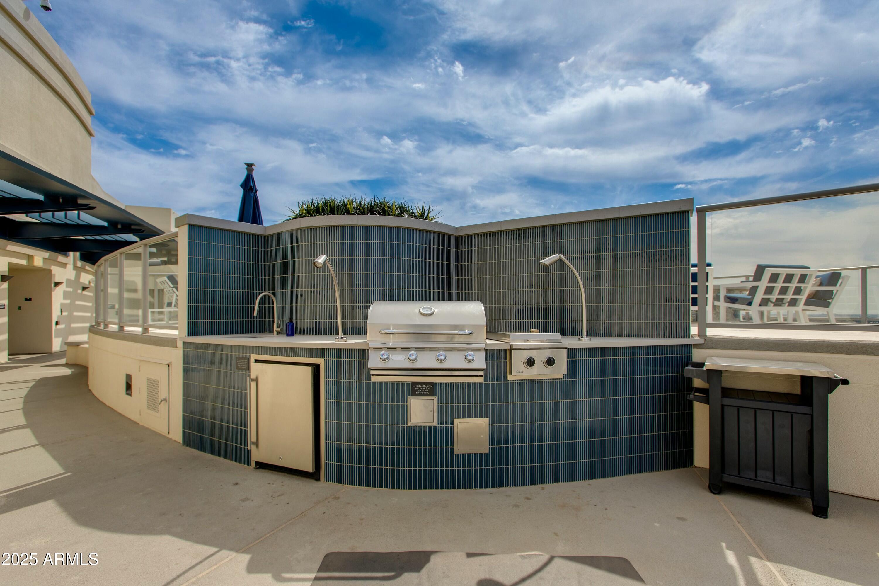 2211 East Camelback Road, Unit 402 Phoenix, AZ 85016 - Photo 22 of 27 Roof BBQ