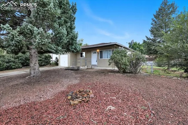 an aerial view of residential houses and outdoor space