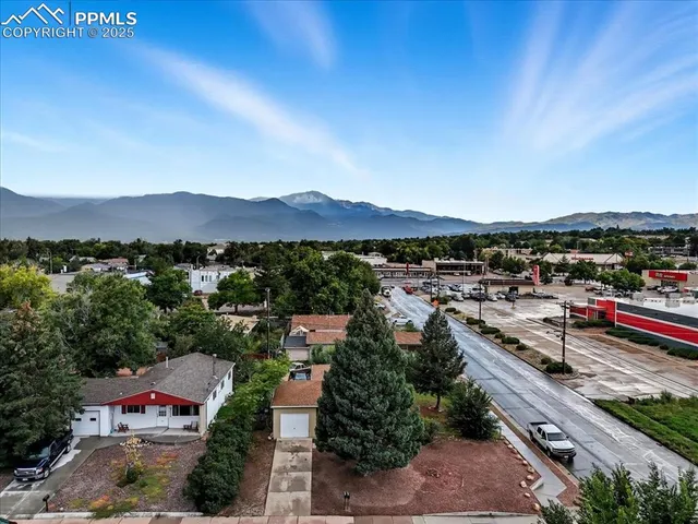 an aerial view of residential house with outdoor space