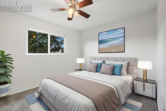 a bedroom with bed and window