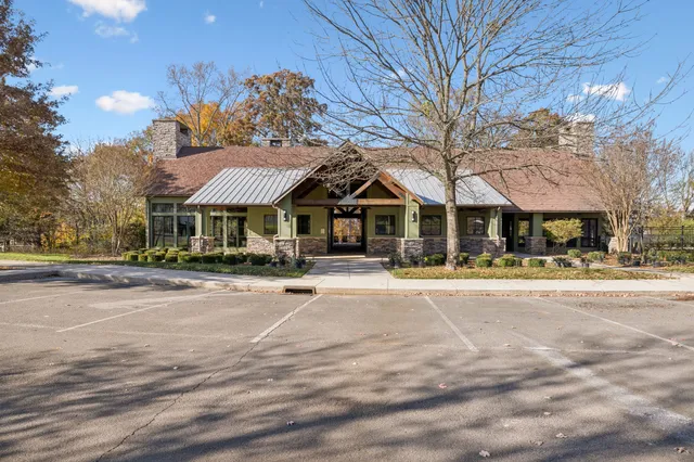 a front view of a building with street view