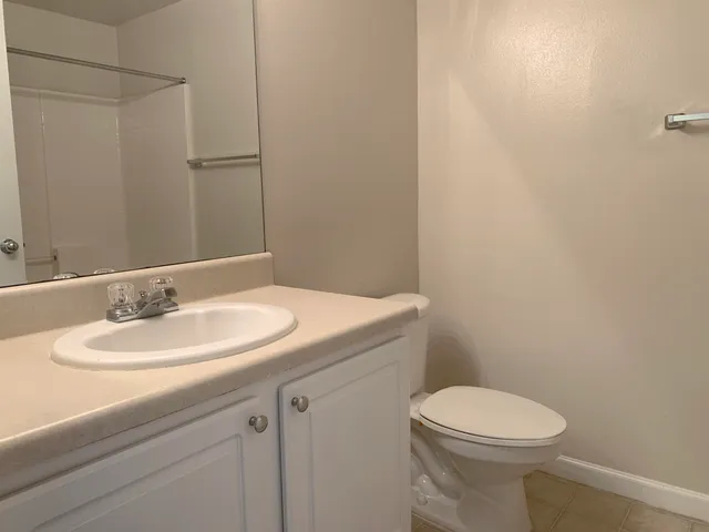 a view of an empty room and entryway