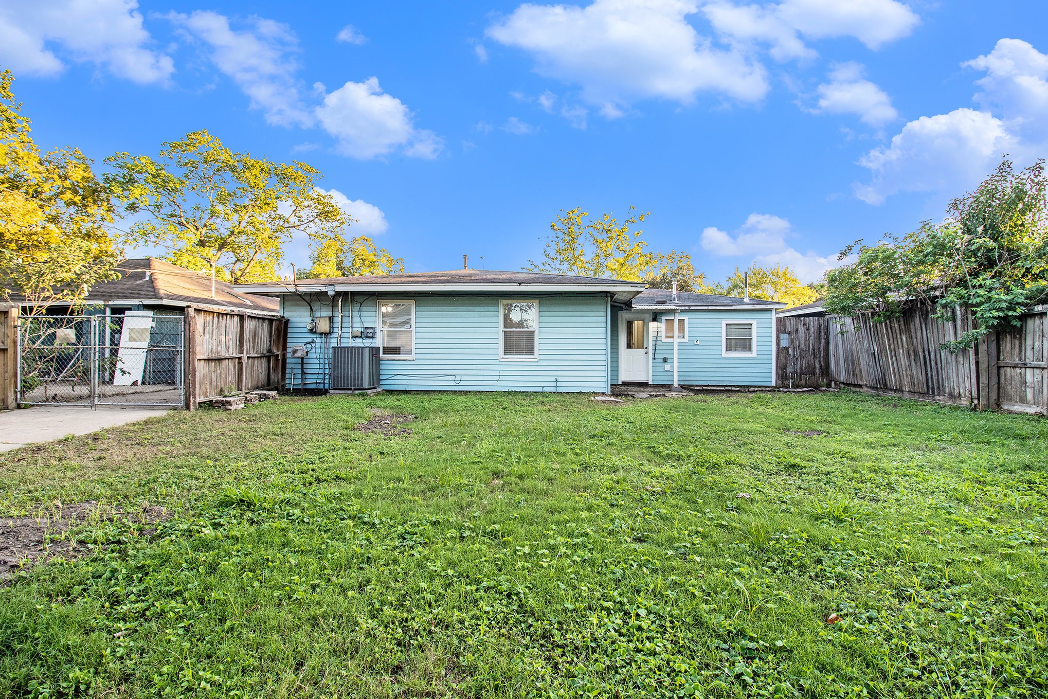 12225 Dumas Street Houston, TX 77034 - Photo 14 of 17 a view of a house with a backyard