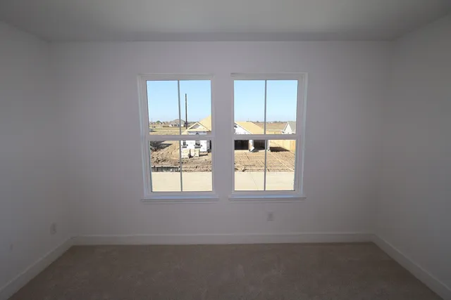 an empty room with window