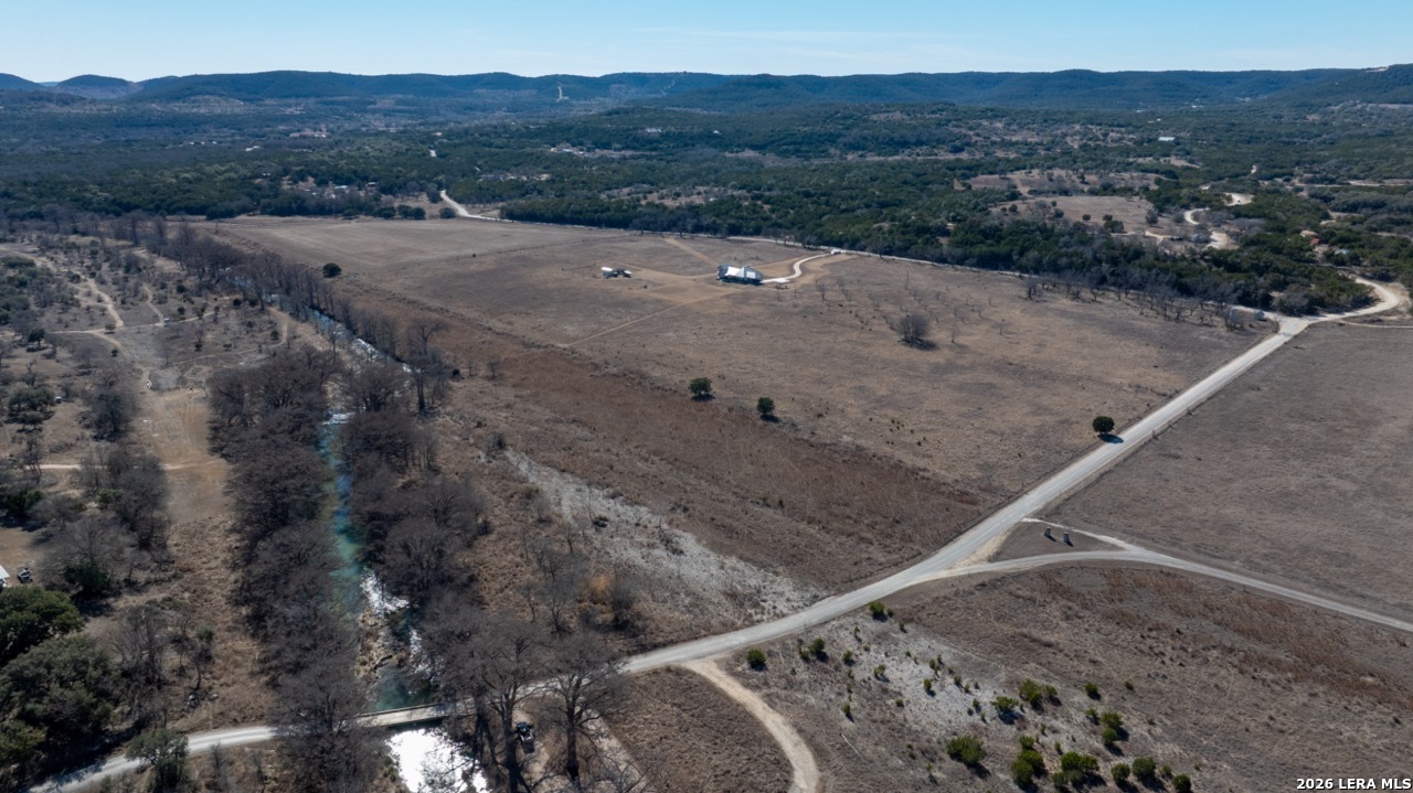 115 Moffett Road Medina, TX 78055 - Photo 14 of 26 a view of a dry yard with mountain
