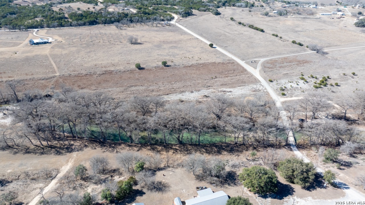 115 Moffett Road Medina, TX 78055 - Photo 20 of 26 a view of a dry yard with trees