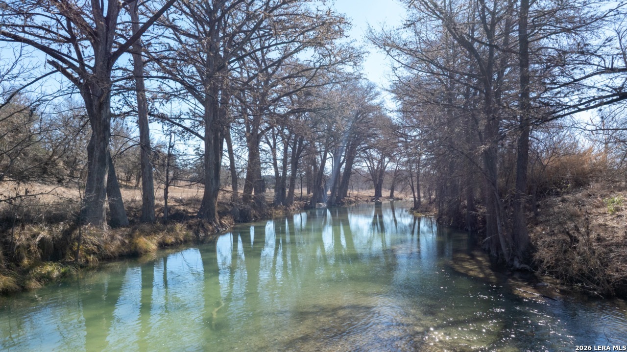 115 Moffett Road Medina, TX 78055 - Photo 25 of 26 a view of water with a yard