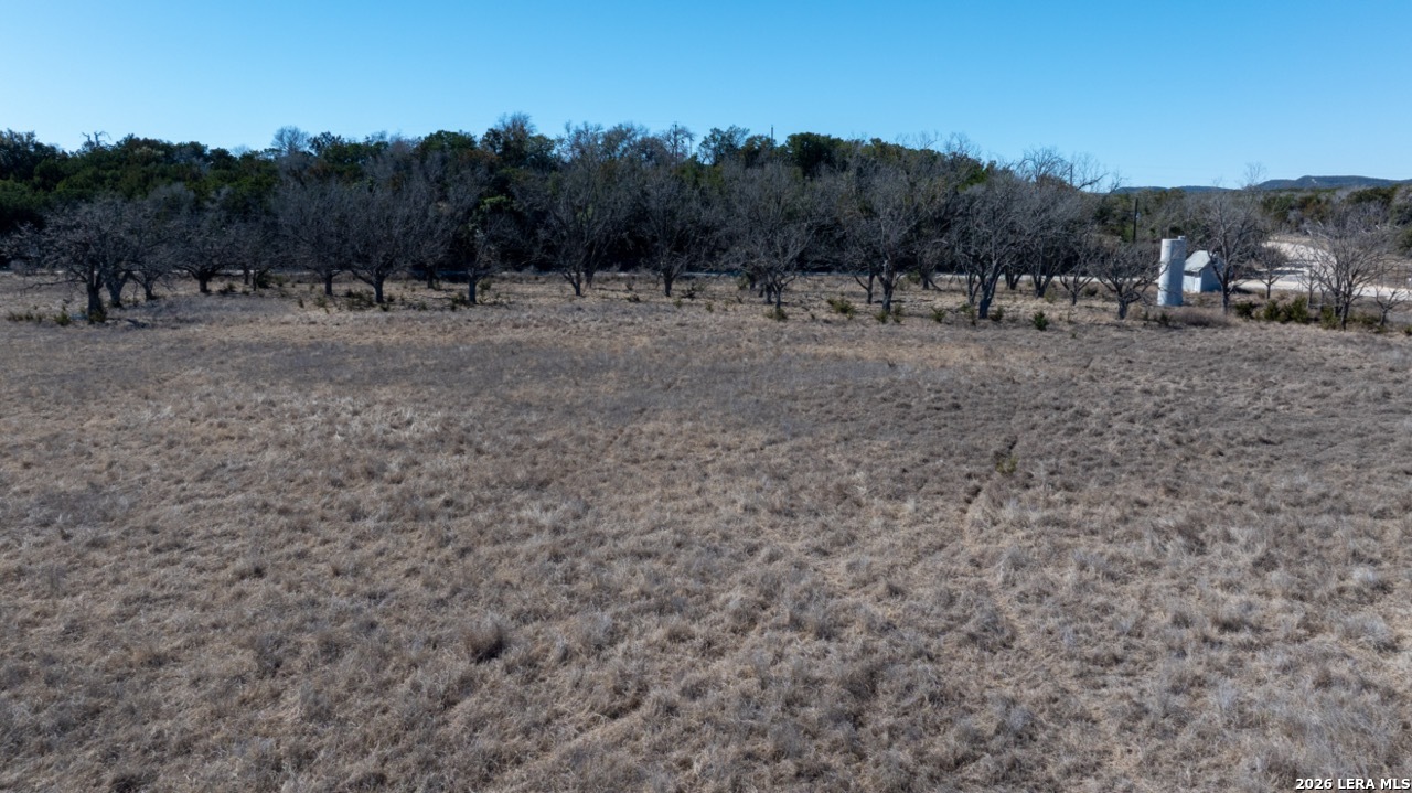 115 Moffett Road Medina, TX 78055 - Photo 9 of 26 a view of a dirt road with mountain view