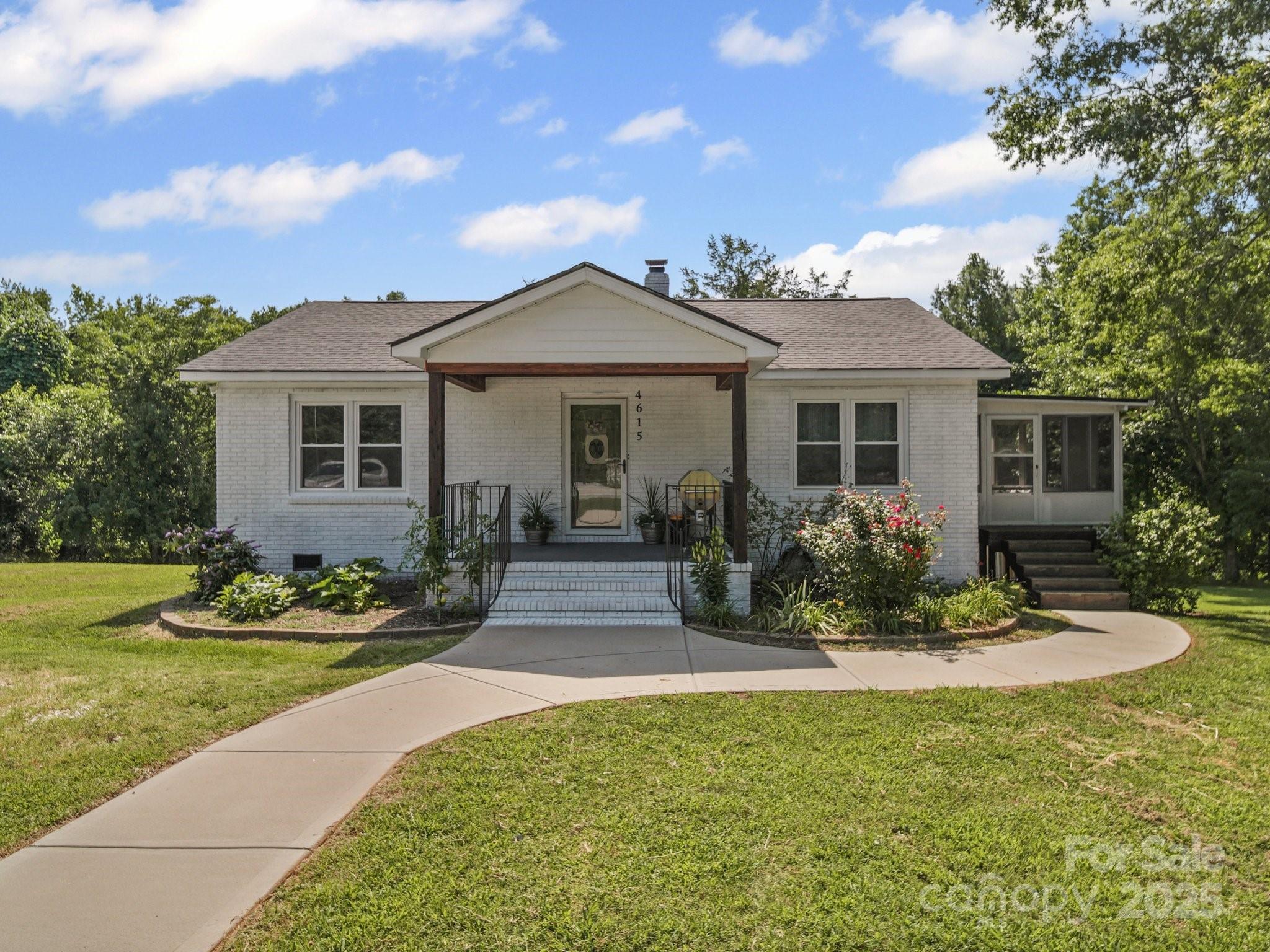 4615 Lockhart Road Sharon, SC 29742 - Photo 1 of 18 a front view of a house with a yard