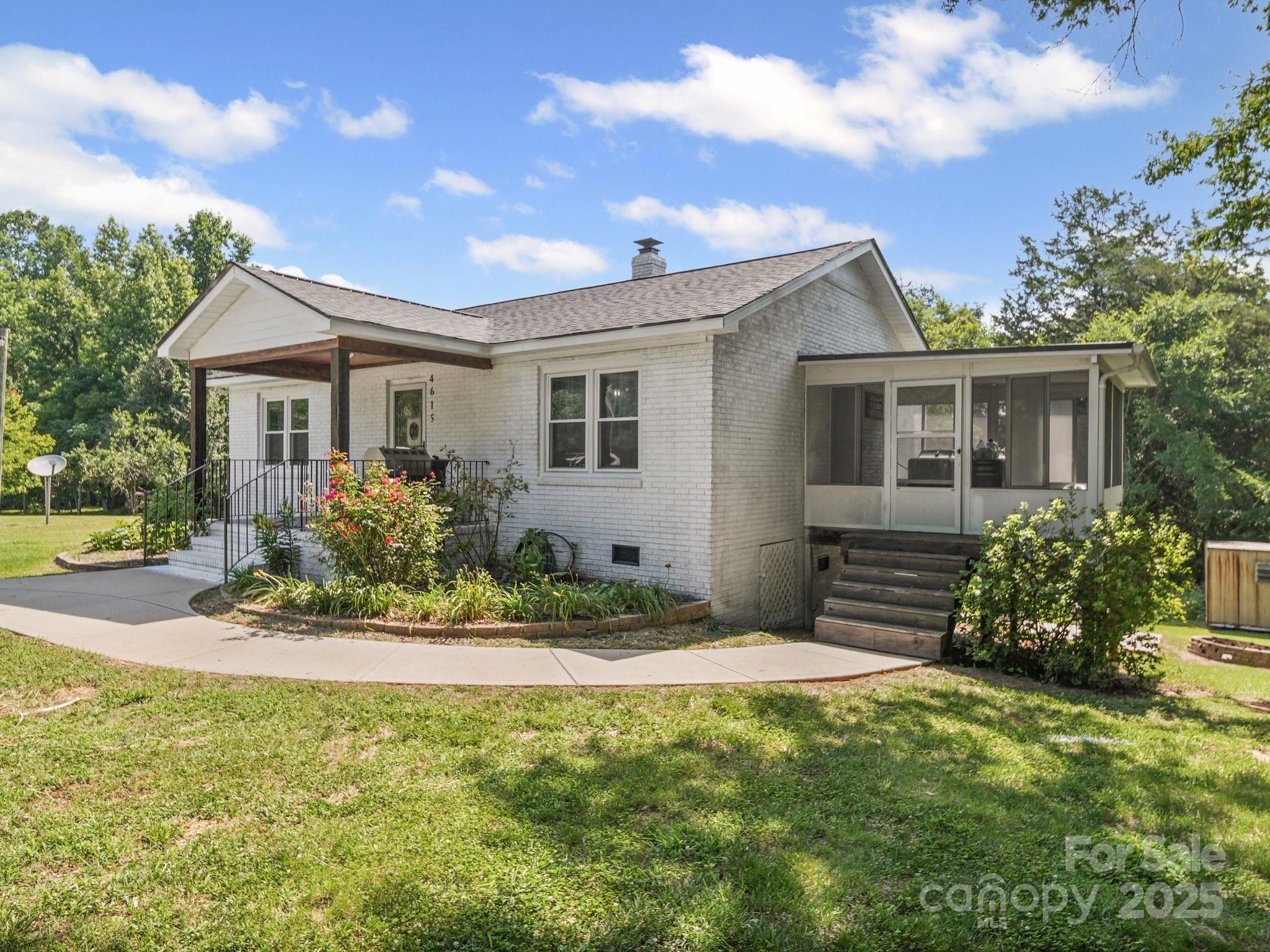 4615 Lockhart Road Sharon, SC 29742 - Photo 14 of 18 a front view of a house with a yard