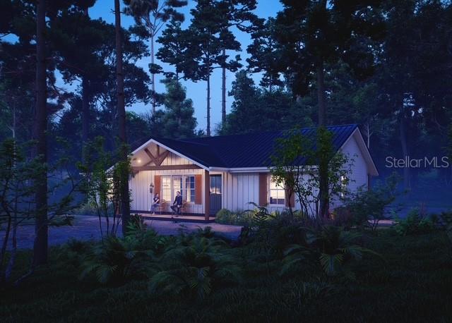 354 Hoot Owl Road Satsuma, FL 32189 - Photo 16 of 20 a front view of a house with a garden