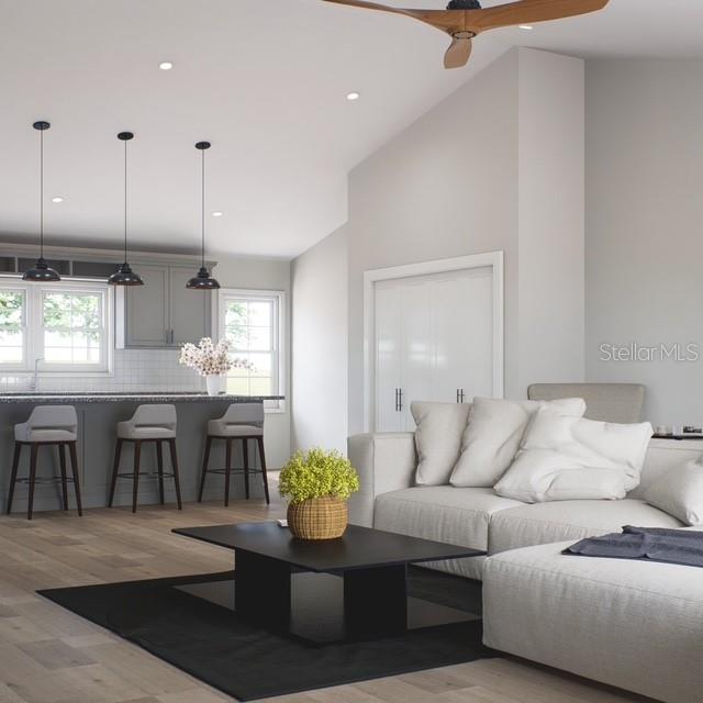 354 Hoot Owl Road Satsuma, FL 32189 - Photo 8 of 20 a living room with furniture and kitchen view