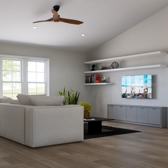 354 Hoot Owl Road Satsuma, FL 32189 - Photo 9 of 20 a living room with furniture and a flat screen tv