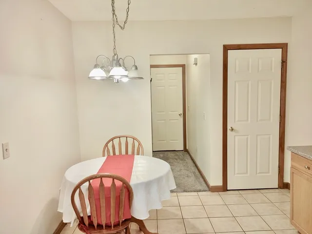 a view of a hallway with windows