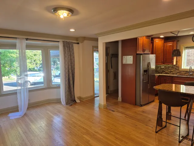 a view of livingroom with furniture window and wooden floor