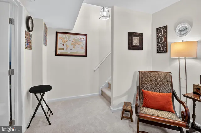 a bathroom with a toilet a sink and a mirror