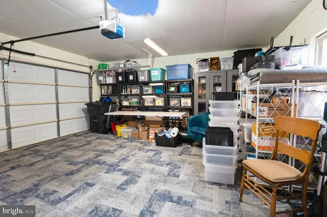 a view of a kitchen with furniture and a kitchen