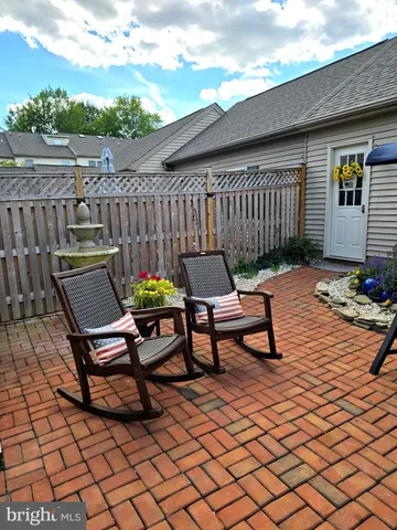 a view of a lounge chairs in the patio