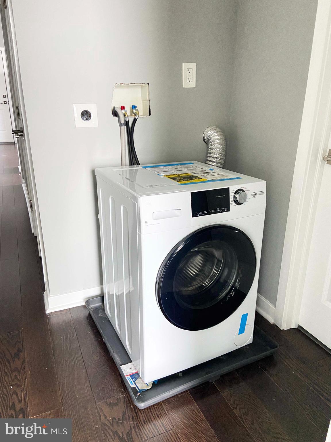 1801 West Venango Street, Unit 4 Philadelphia, PA 19140 - Photo 13 of 21 a utility room with dryer and washer