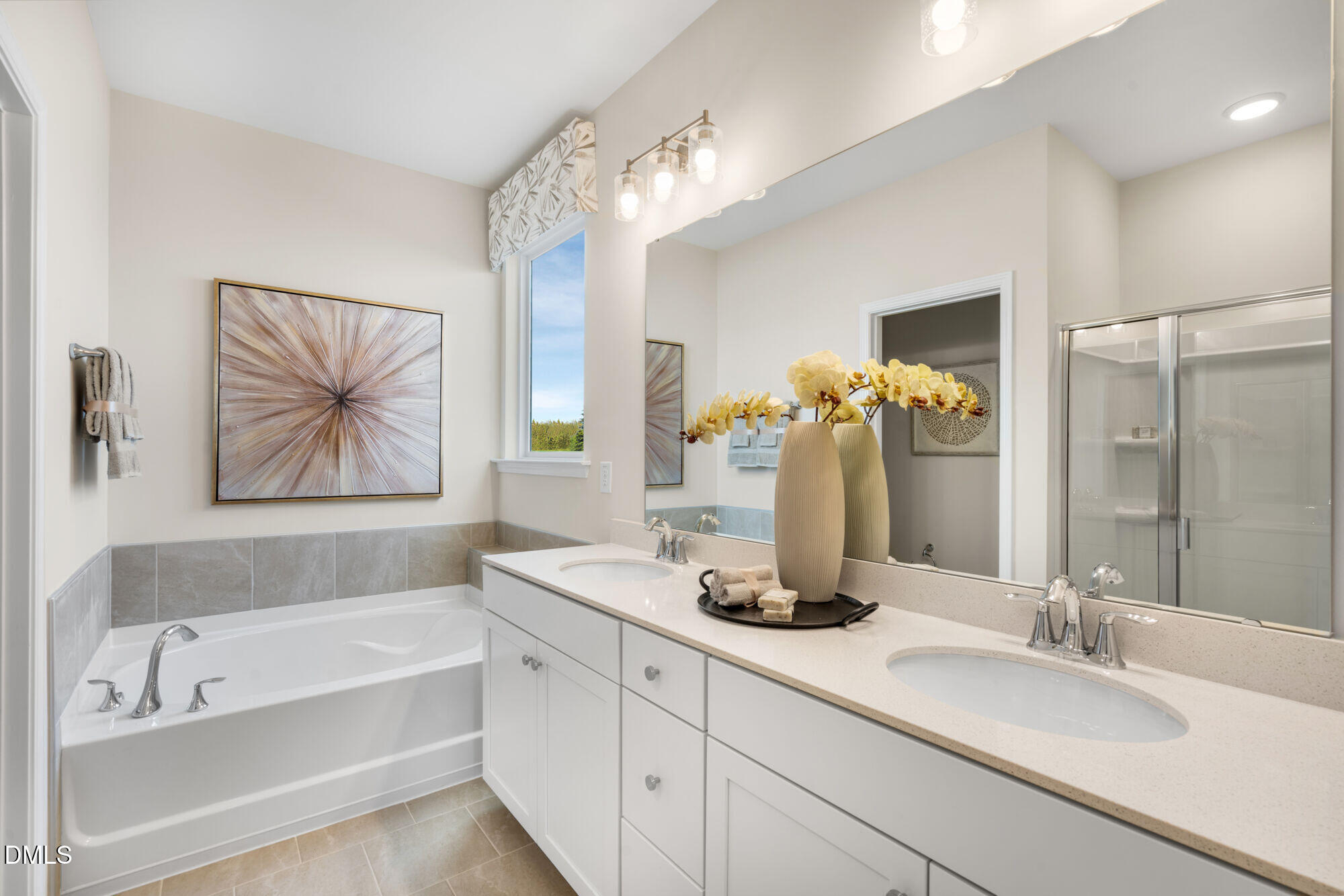 108 Vulcan Street Garner, NC 27529 - Photo 12 of 22 a bathroom with a tub sink and mirror