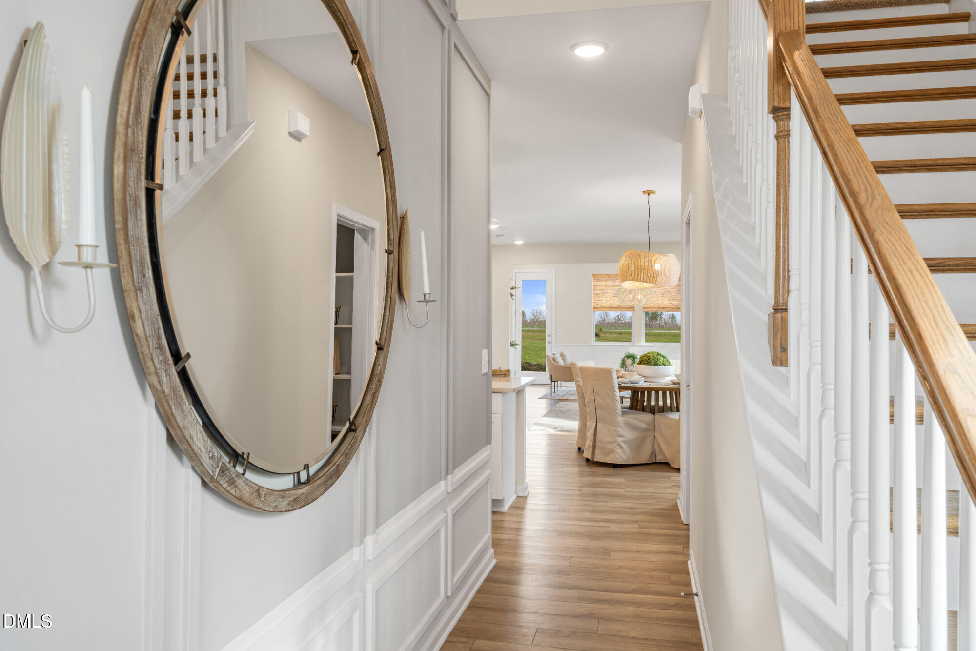 108 Vulcan Street Garner, NC 27529 - Photo 2 of 22 a view of a hallway with furniture and floor to ceiling window