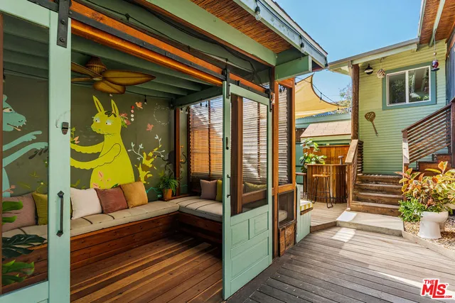 a view of wooden floor in front of house