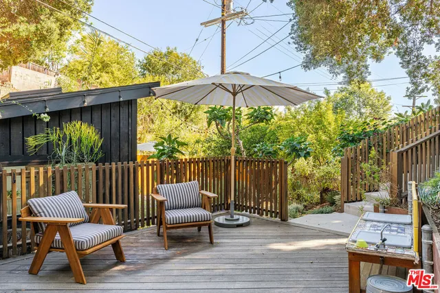 a view of a wooden door of the house