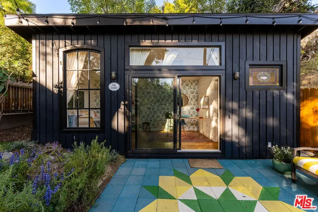 a living room with a couch and a table