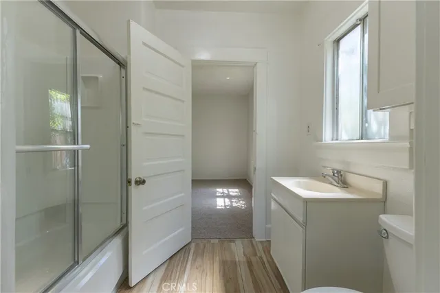 a bathroom with a sink and mirror