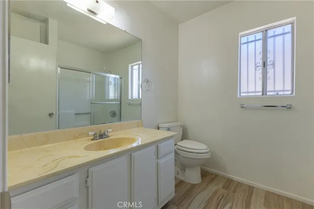 a bathroom with a sink and a toilet
