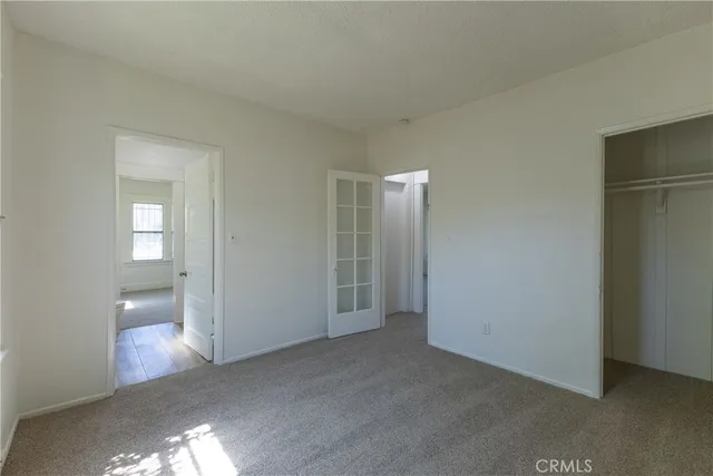 a view of a room with a hallway