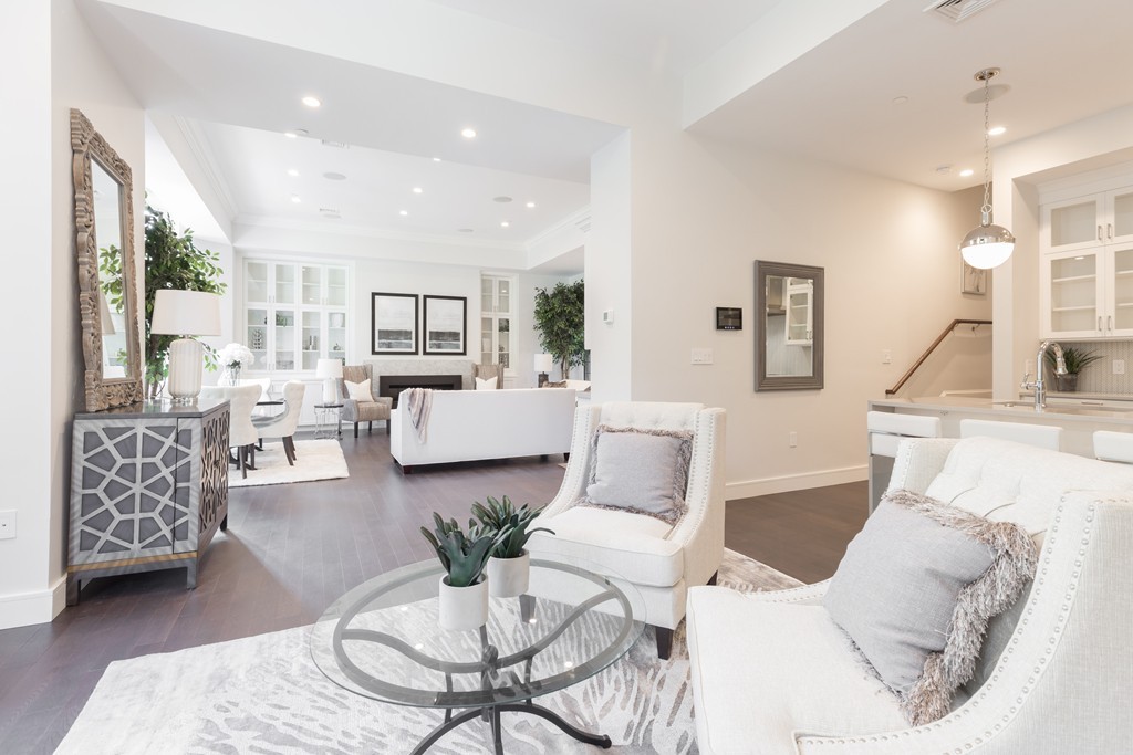 11 Exeter Street, Unit 3 Boston, MA 02116 - Photo 4 of 17 a living room with furniture and a large window