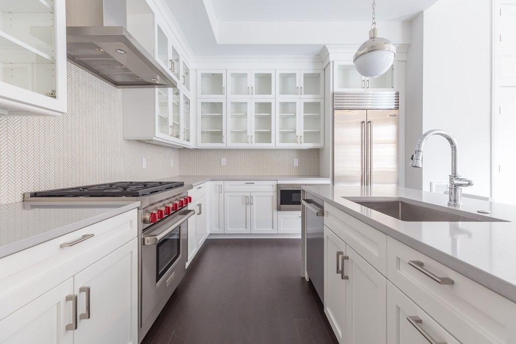 11 Exeter Street, Unit 3 Boston, MA 02116 - Photo 7 of 17 a kitchen with a stove and a sink