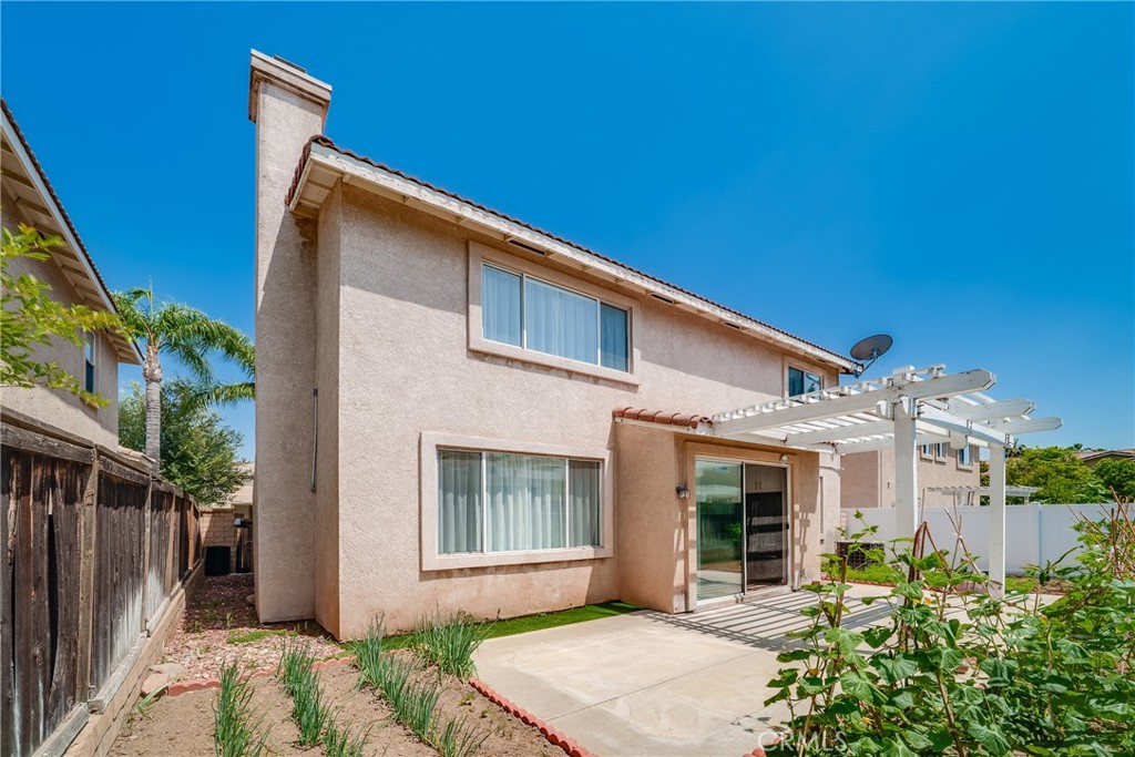 7358 Freedom Rancho Cucamonga, CA 91730 - Photo 27 of 34 a front view of a house with a yard