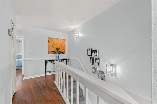 a view of a livingroom with wooden floor