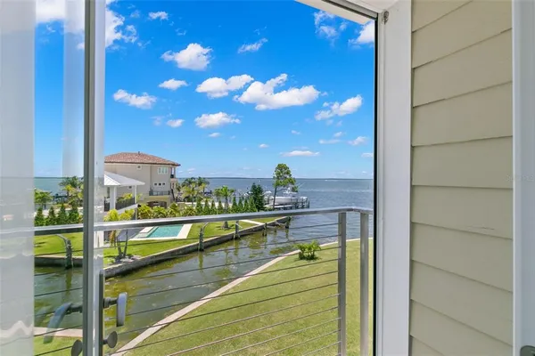 a view of a balcony with city view