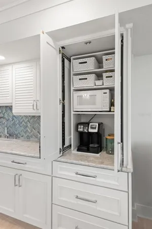 a close view of dresser and mirror