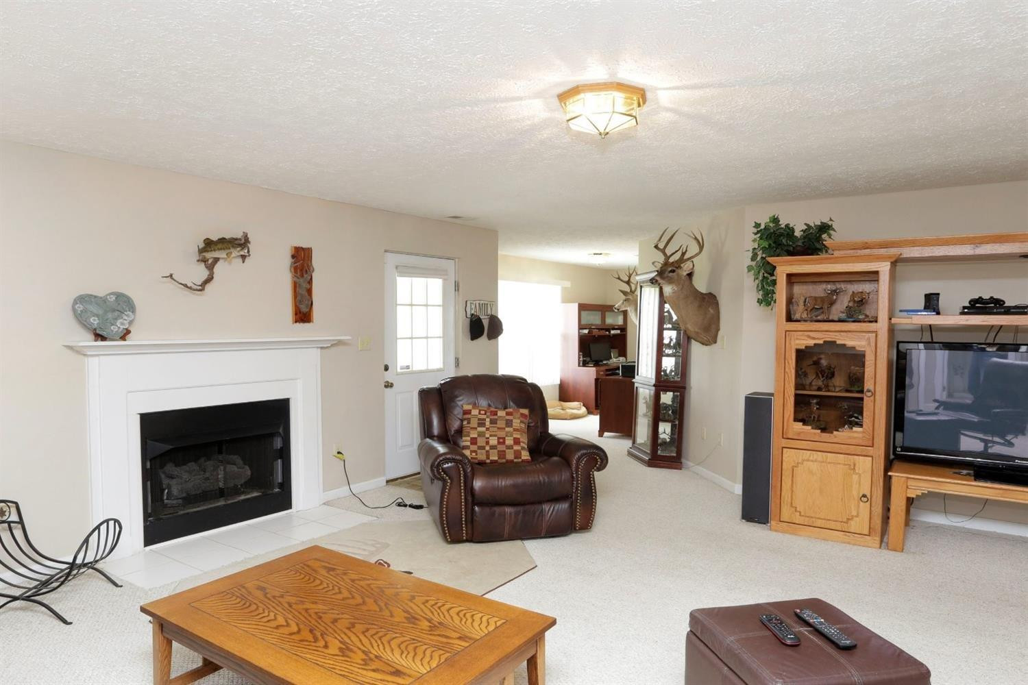 148 Coal Ridge Lane Georgetown, KY 40324 - Photo 28 of 39 Basement family room w/ fireplace