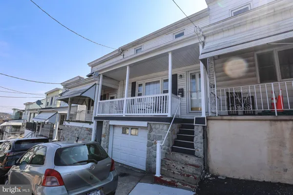 a front view of a house with balcony