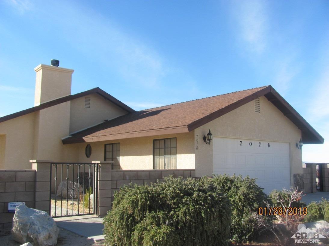7078 Cascade Road Joshua Tree, CA 92252 - Photo 2 of 21 a view of a house with balcony